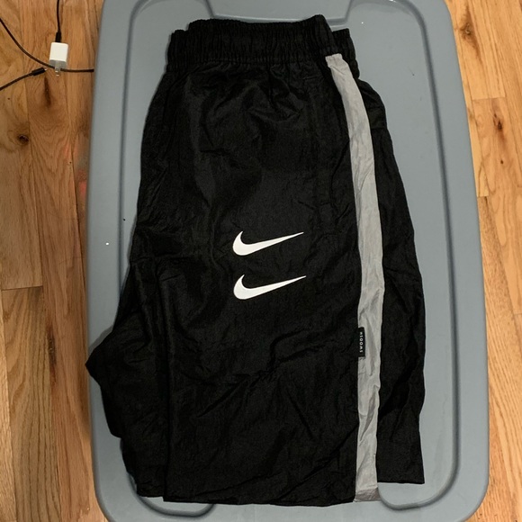 nike swoosh woven track pants
